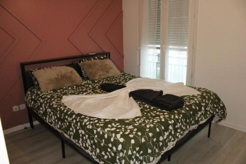 Postel nebo postele na pokoji v ubytování Très bel appartement - Meaux - proche Disneyland