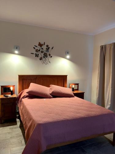 Ένα ή περισσότερα κρεβάτια σε δωμάτιο στο Las Piedras