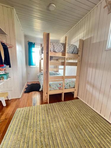 Postel nebo postele na pokoji v ubytování Acogedora Casa en Ancud Central Linda Vista