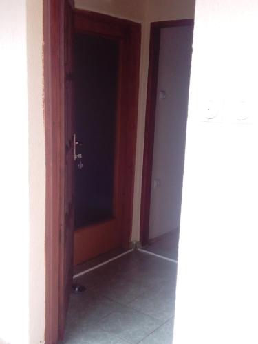 an open door in a room with a hallway at Rooms Apartment Durmitor in Žabljak