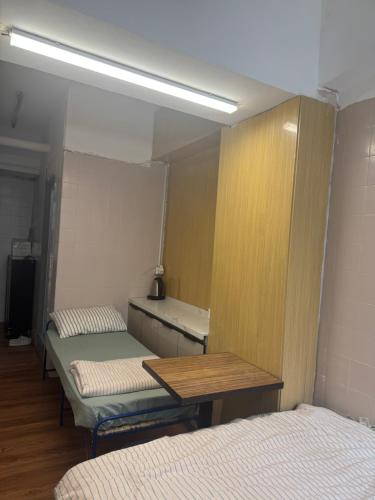 Postel nebo postele na pokoji v ubytování 旅居1号