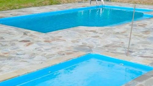 Πισίνα στο ή κοντά στο Casas de Campo com Piscina, Pesca - Mata Atlântica