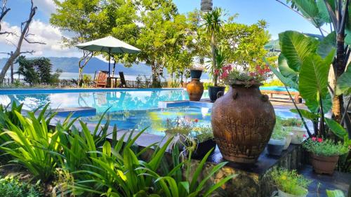 Πισίνα στο ή κοντά στο Rumah Arunika 27