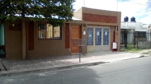 a small house on the side of a street at La Comarca in San Luis
