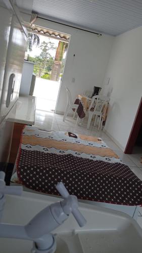 a view of a room with a bed in a room at Recanto Santa Lídia in Penha