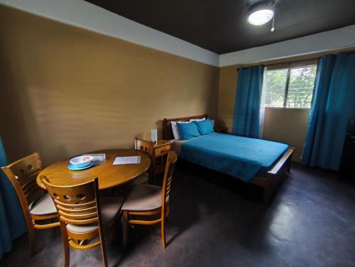 Una cama o camas en una habitación de Casa Morada