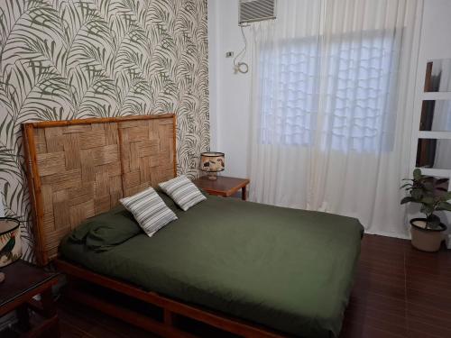 Postel nebo postele na pokoji v ubytování Gelma's house