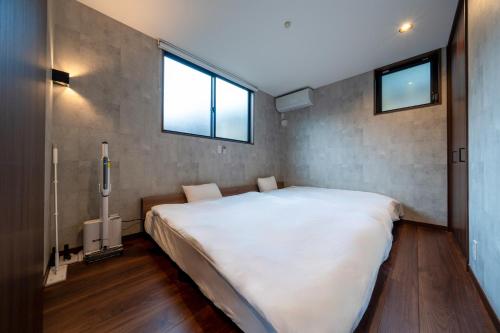 Ένα ή περισσότερα κρεβάτια σε δωμάτιο στο RIVER VIEW HOUSE-Sauna-