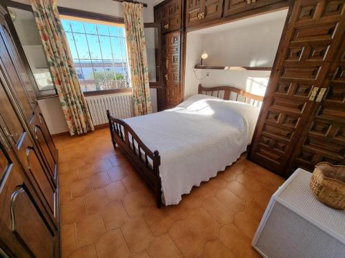 Postel nebo postele na pokoji v ubytování Casa de vacaciones a 700m de la playa con piscina privada - HISP-236-183