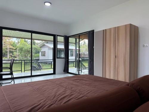 Кровать или кровати в номере Q Residence