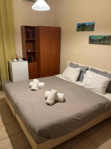 Ένα ή περισσότερα κρεβάτια σε δωμάτιο στο Hotel King