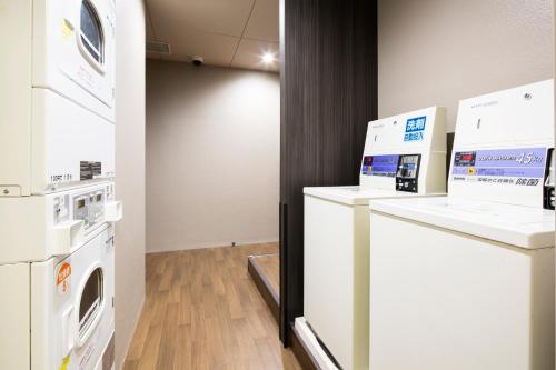 Kuchyň nebo kuchyňský kout v ubytování HOTEL MYSTAYS Kanda