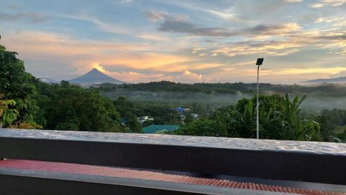 a view of a mountain from the roof of a house at Uno's Krib - Pilar in Pilar