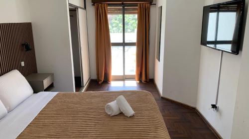 Postel nebo postele na pokoji v ubytování Depto con Terraza Privada - Cerca De Todo