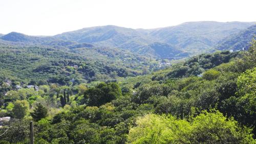 a view of a valley with trees and mountains at Wandritu in Río Ceballos
