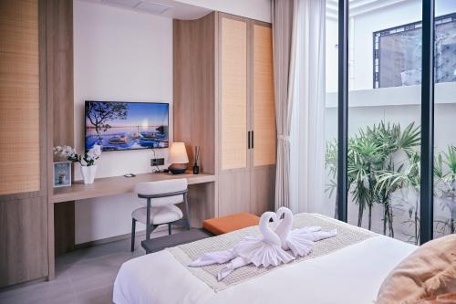 Ένα ή περισσότερα κρεβάτια σε δωμάτιο στο Étoile Kata Luxury Pool Villas by Astra