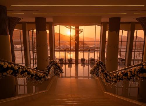 a sunset seen from the stairs of a cruise ship at Petra Pillars Luxury Hotel in Petra