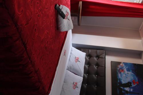 Ένα ή περισσότερα κρεβάτια σε δωμάτιο στο Hostal Paris MYP 2