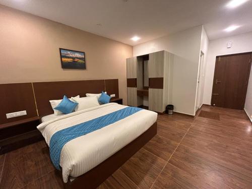 Giường trong phòng chung tại Hotel Park Land