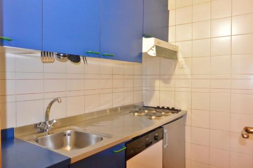 Kuhinja oz. manjša kuhinja v nastanitvi Appartamenti La Maison de Vacances