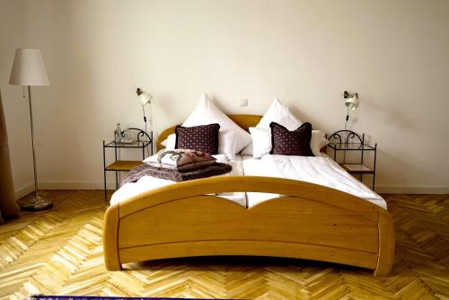 Postel nebo postele na pokoji v ubytování Boutique Hotel Le Baron