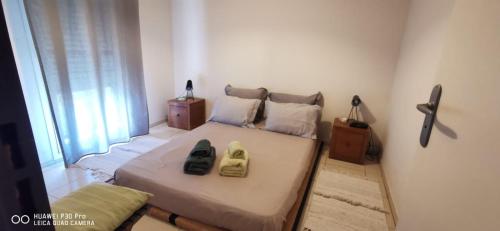 Postel nebo postele na pokoji v ubytování Appt "Longanis" à St-Gilles Les Bains - Roquefeuil - T3 vue mer - Agréable et calme