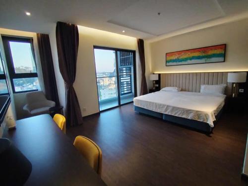 En eller flere senge i et værelse på Shaphire