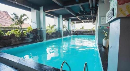 Πισίνα στο ή κοντά στο Grand Darmo Suite by AMITHYA