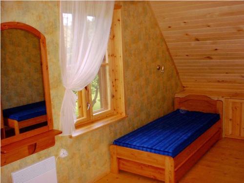 Postel nebo postele na pokoji v ubytování Udumäe Holiday Farm