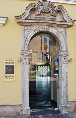 an archway in the side of a building at Avalon Hotel & Conferences in Rīga