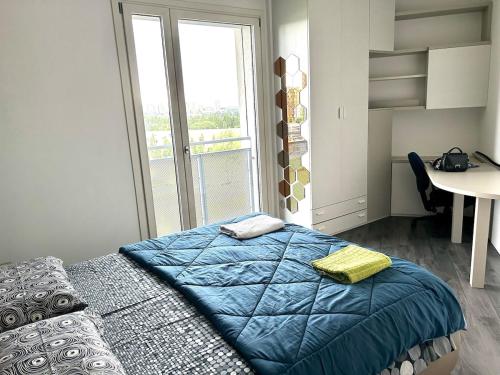 Ένα ή περισσότερα κρεβάτια σε δωμάτιο στο Merlata residence Terrace