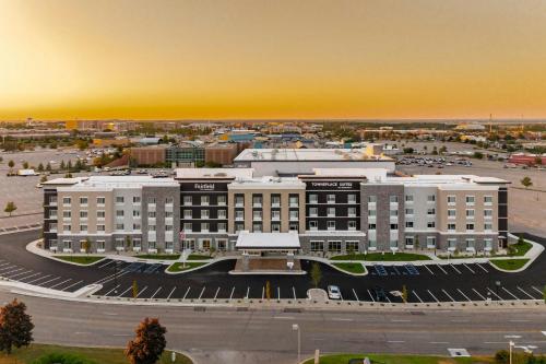 an aerial view of a large building with a parking lot at TownePlace Suites Dayton Beavercreek in Beavercreek