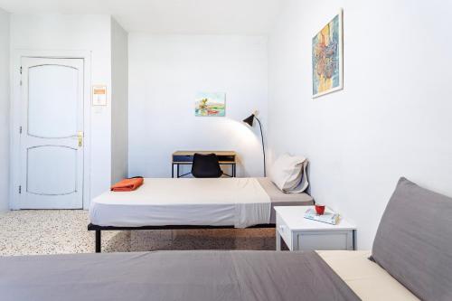 Ένα ή περισσότερα κρεβάτια σε δωμάτιο στο Boho Hostel