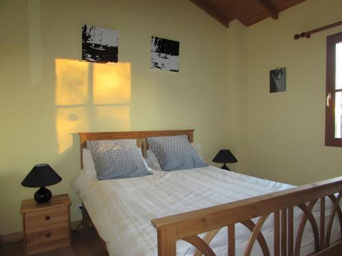 Voodi või voodid majutusasutuse Gîte Tournesol -Gîtes Au Bas Marais toas