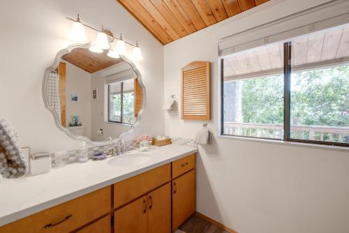 a bathroom with a sink and a mirror at The Three Bears MCA 901 in Manzanita