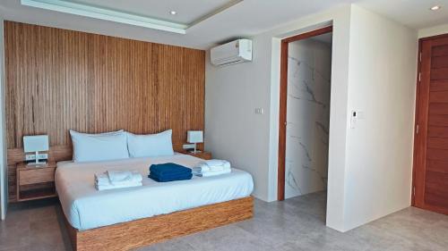 Ένα ή περισσότερα κρεβάτια σε δωμάτιο στο Santi Pura Villas