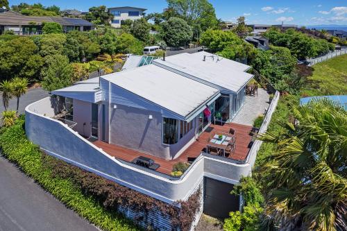 an overhead view of a house with a deck at Aporo Nelson Holiday Home in Nelson