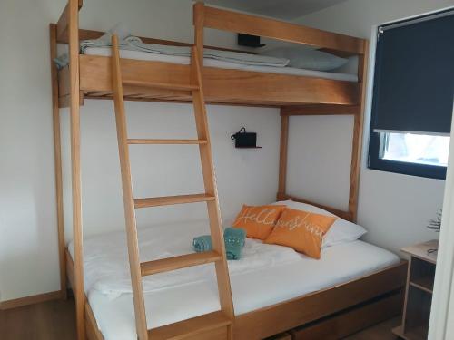 Ένα ή περισσότερα κρεβάτια σε δωμάτιο στο Vortex PBK MobileHome