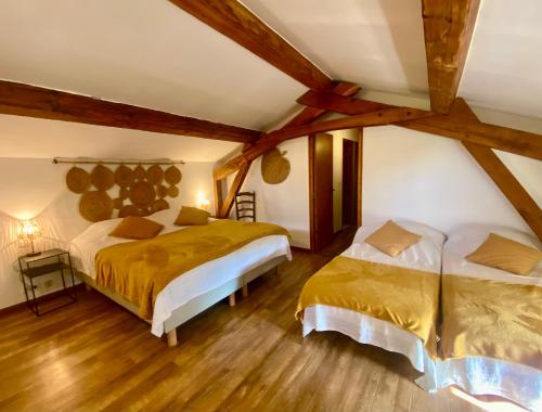 Llit o llits en una habitació de Le MAZET