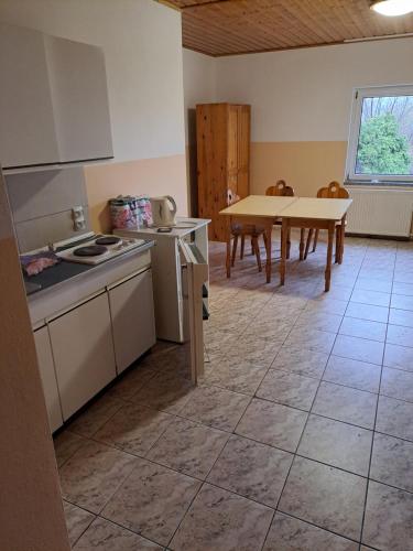 Køkken eller tekøkken på Szafirowy Pensjonat Pracowniczy