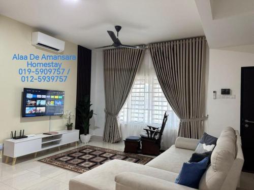 TV a/nebo společenská místnost v ubytování Alaa De Amansara Homestay