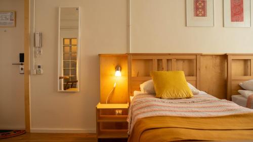 Ένα ή περισσότερα κρεβάτια σε δωμάτιο στο Urban Yurt