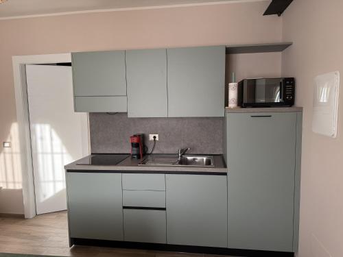 Η κουζίνα ή μικρή κουζίνα στο NessunConfine