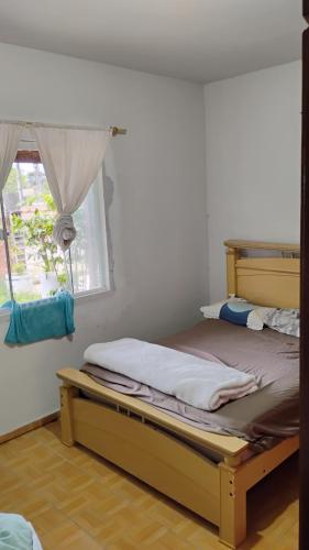 Postel nebo postele na pokoji v ubytování Enumo House