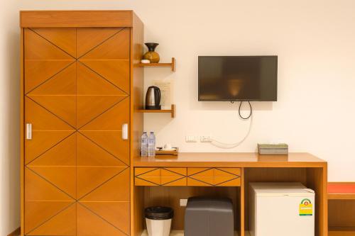 TV a/nebo společenská místnost v ubytování Prisha Inn