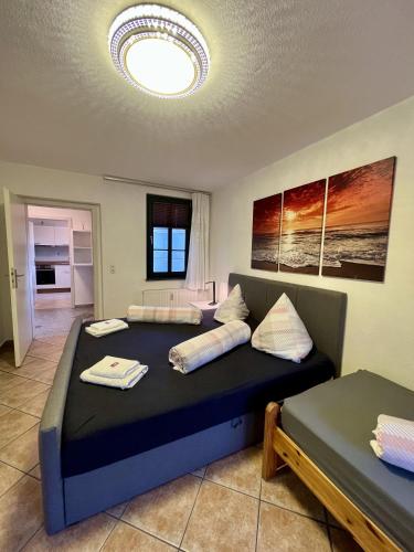 a bedroom with two beds in a room at Ferienwohnungen Rehn in Dresden