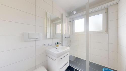 Koupelna v ubytování Helle 2 Schlafzimmer Wohnung in Davos - grosszügig, zentral und ruhig gelegen