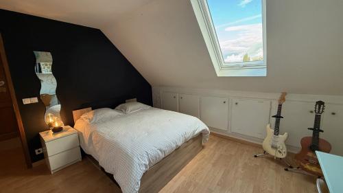 Postel nebo postele na pokoji v ubytování Jean Monnet - Séjour à Auxerre