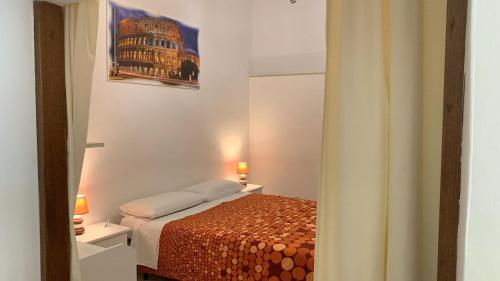 Ένα ή περισσότερα κρεβάτια σε δωμάτιο στο Casa butterfly Sacrofano