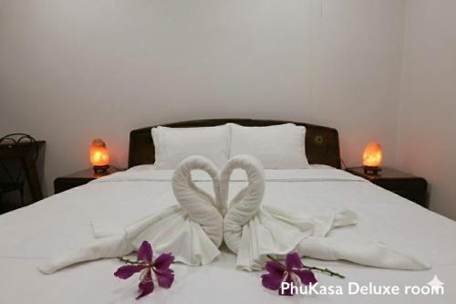 Una cama o camas en una habitación de PhuKasa Valley Maesot